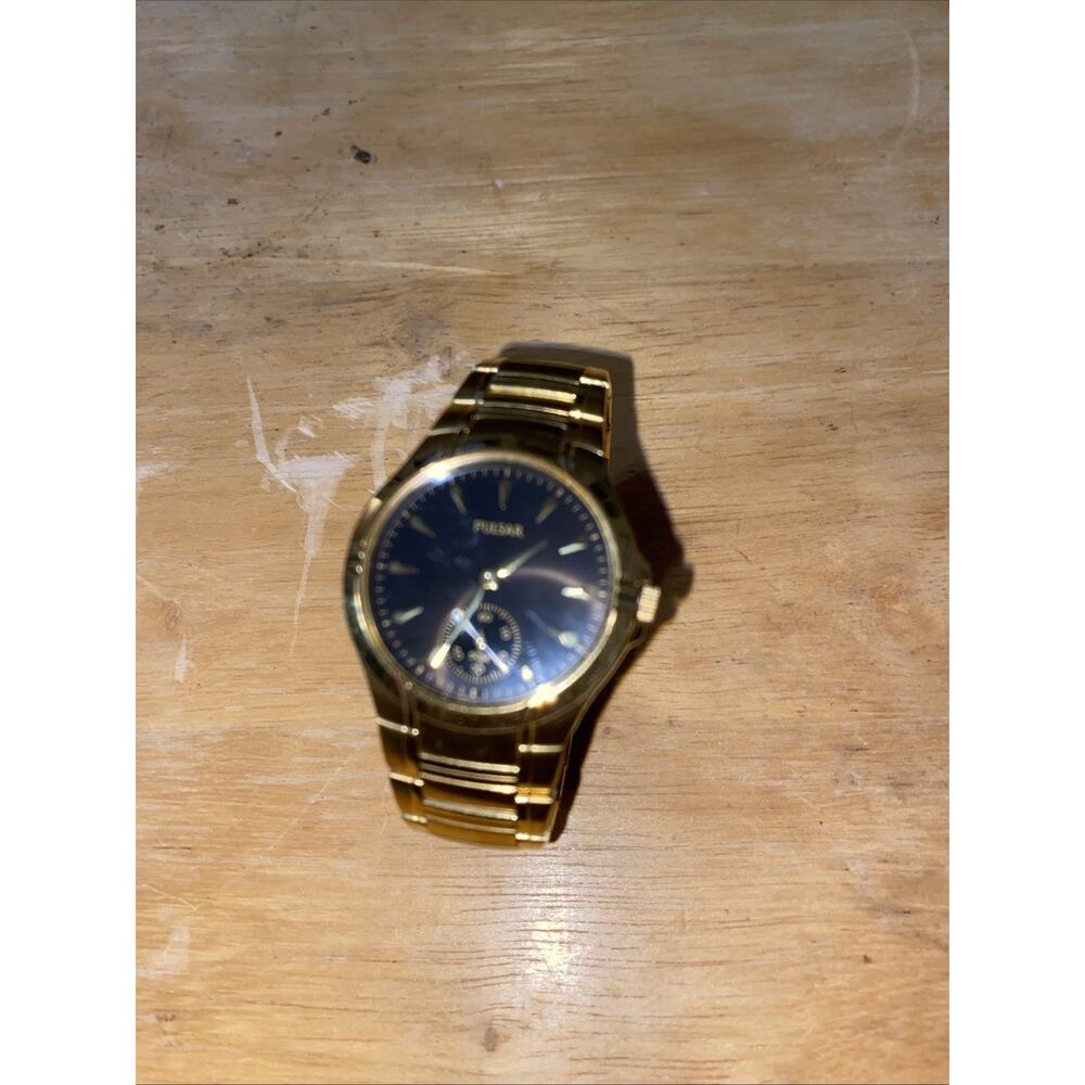 Pulsar men's watch Japan VD78-X003 Black Dial, Gold tone stainless 7.3" band